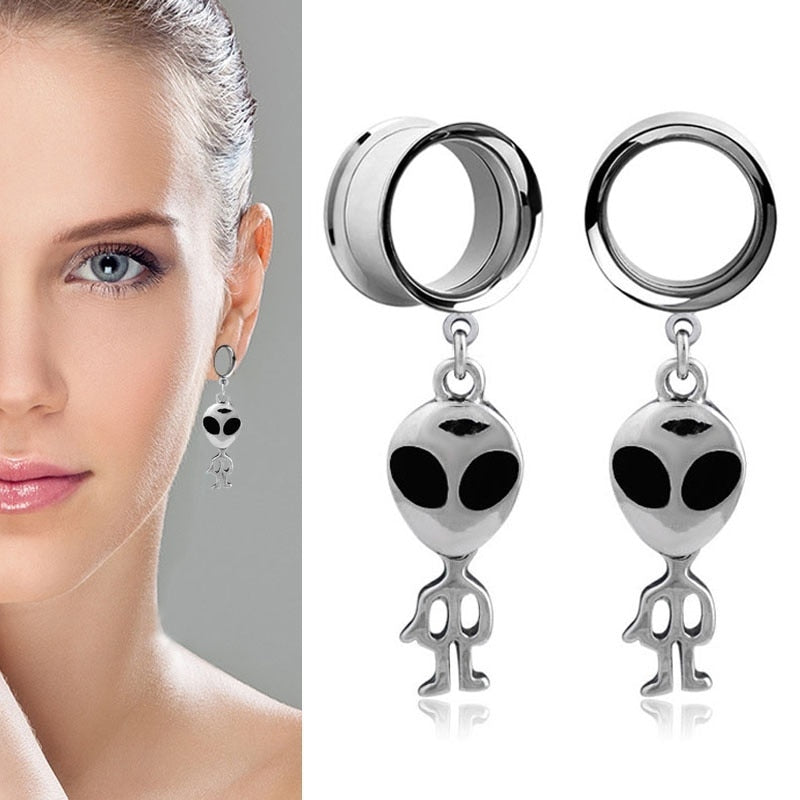 A Pair Of Little Alien Expander Earrings.